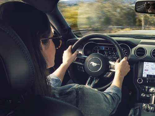 2023 Ford Mustang view of woman driving