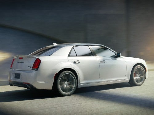 2023 Chrysler 300C driving down the road