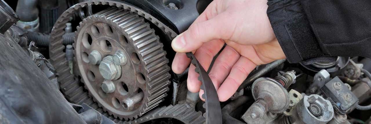 Service Technician Changing a Timing Belt