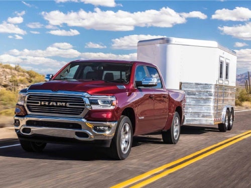 2024 RAM 1500 towing an enclosed trailer 
