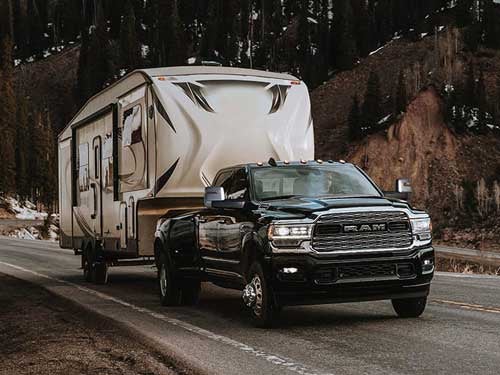 2023 RAM 3500 towing a camper