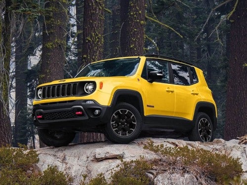 2023 Jeep Renegade parked on top of a big rock
