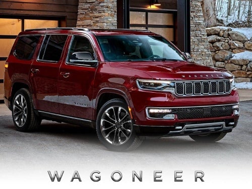 2024 Wagoneer exterior view parked outside a modern home